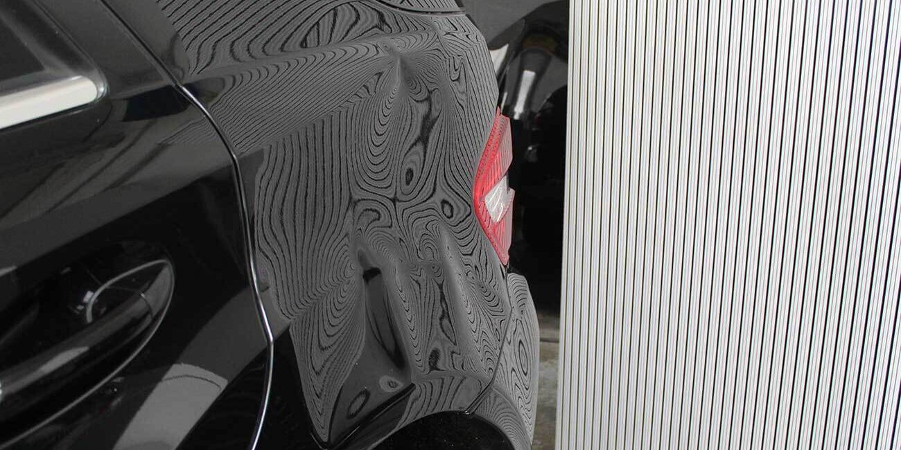 Delle-in-Fahrzeugseite-Dellentechnik-Tayfun Delle in Fahrzeugseite- Dellentechnik Tayfun- Dellenzentrum Pforzheim